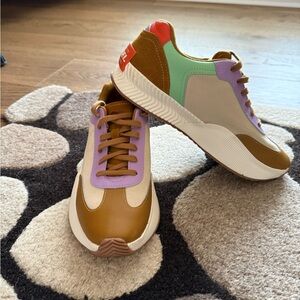 Waterproof Sorel Women's Sneakers in Brown, Cream, and Purple